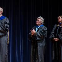 faculty on stage